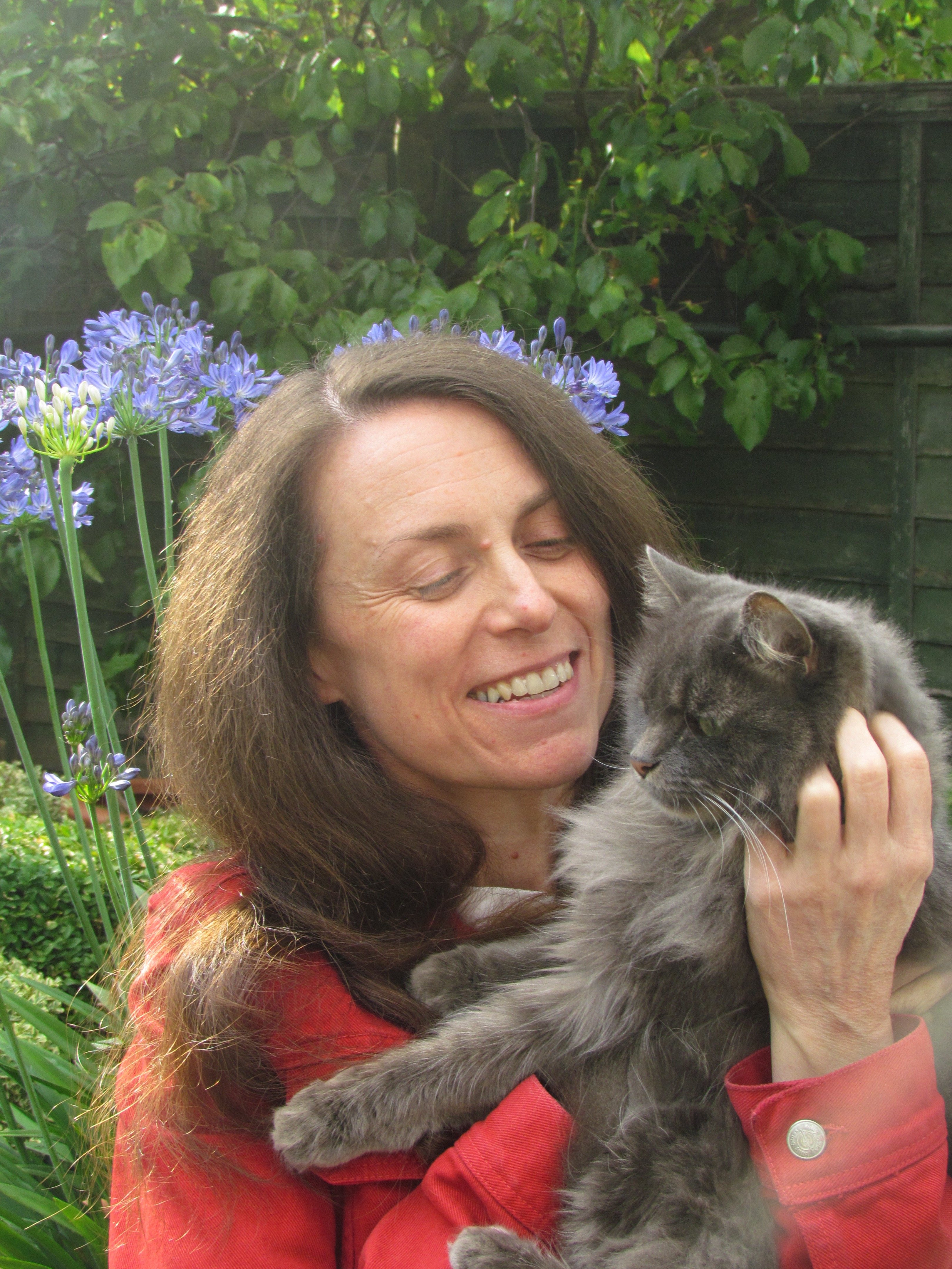Picture of Professor Clare Bryant holding her cat